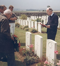   Visiting a grave on the 1916 Somme battlefield.