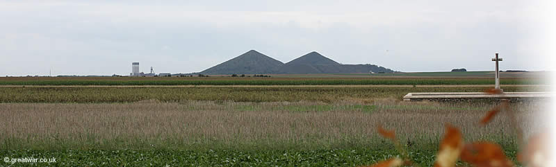 View looking due south from St. Mary's A.D.S. Cemetery of the Double Crassier slag heap, one of the landscape characteristics of the Loos battlefield in Artois. Ninth Avenue British Military Cemetery is in the foreground.