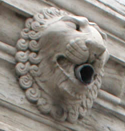 A carved lion's head gargoyle for the pipe draining water from the roof of the northern tower at the Loos Memorial entrance.