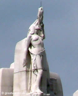 The figure of Peace at the highest point of the memorial at the top of one of the pylons.