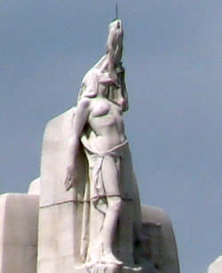 The figure of Peace at the highest point of the memorial at the top of one of the pylons.