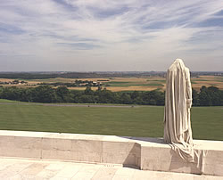 Mother Canada stands at the north-eastern side of the memorial, with the view of the Lens-Douai plain stretching before her.