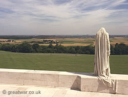 Mother Canada stands at the north-eastern side of the memorial, with the view of the Lens-Douai plain stretching before her.
