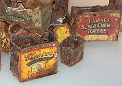 Tins including toffee tins found in the Wellington Quarry.