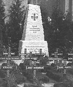 German graves and memorial in a churchyard near Ypres in 1914-1918.