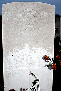 Headstone of Lance Corporal Francis Ledwidge in Artillery Wood Cemetery.