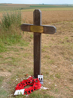 Cross marking the spot where 
			  the remains of Private George Nugent were found on the old Somme 1916 battlefield.