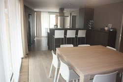 Dining area and kitchen in the Apartment Froidure, Ieper -Ypres, Belgium.