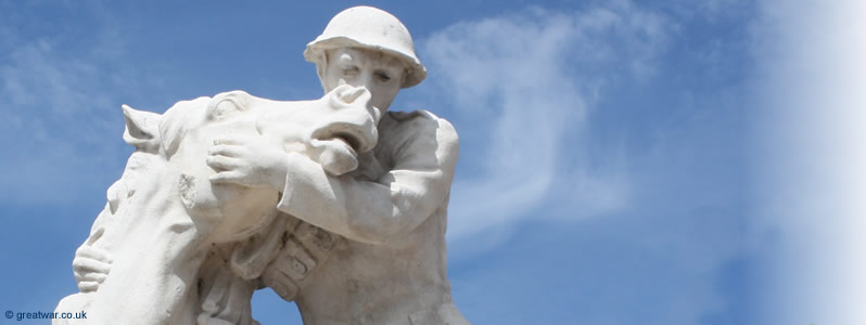 A British soldier cradles his wounded horse at the 58th Division Memorial, Chipilly, Somme battlefields.