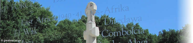 Cross of Consecration in the centre courtyard of the museum, seen through the etched glass window.