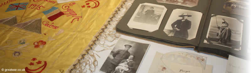 Embroidered silk scarf and photos on display at the Franco-Australian Museum.