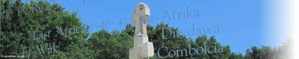 Cross of Consecration in the centre courtyard of the museum, seen through the etched glass window.