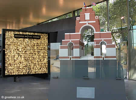 Inside the Thiepval Visitor Centre, with (left) the photographic panel of 600 of the Missing of the Somme and (right) Lutyens' scale model for the memorial.