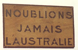 N'oublions jamais l'Australie: let us never forget Australia sign in the Victoria School hall.