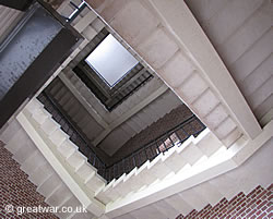 View looking up to the top of the tower from the stairwell at the base of the tower.