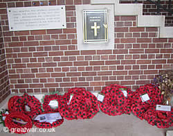 Poppy wreaths laid in Remembrance near to the Memorial Register box inside the tower.