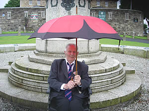 First World War Veteran Harry Patch shelters from the rain at the Duke of Cornwall's Light Infantry Regimental Day in Bodmin, June 2007 (photograph courtesy of Nick Fear)