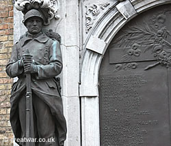 Detail of one of the four bronze statues on the Ypres War Victims Monument.
