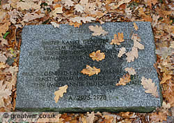 Stone grave marker for six soldiers including ten burials of unidentified German soldiers.