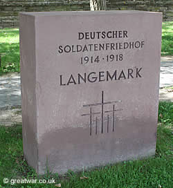 Stone at the entrance to Langemark cemetery, bearing the motif of the five crosses for the Volksbund.