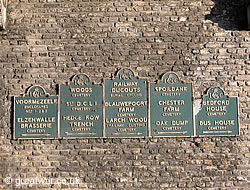 Signs to British and Commonwealth cemeteries.