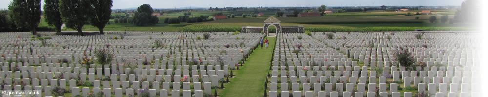 Tyne Cot Cemetery looking towards the spires of Ypres and the hill of the Kemmelberg on the horizon.