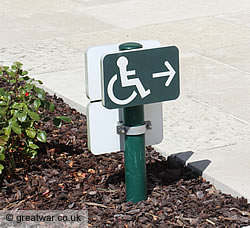 Green signs directing the route for disabled visitors and wheelchairs.
