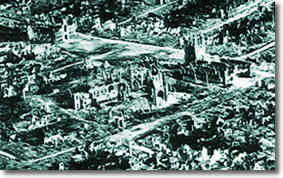 Photograph 3: A shattered city. Ypres after the 1914-1918 war. (IWM)